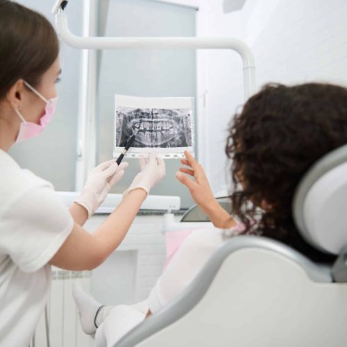 Rear,View,To,A,Dentist,Showing,Patient,Panoramic,Dental,X-ray